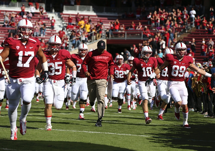 2013StanfordASU-012.JPG - Sept.21, 2013; Stanford, CA, USA; Stanford Cardinal team, lead by head coach David Shaw (center), takes the field prior to the game against the Arizona State Sun Devils at  Stanford Stadium. Stanford defeated Arizona State 42-28.